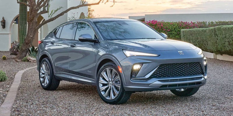 2026 Buick Envista outside house with gravel and cacti